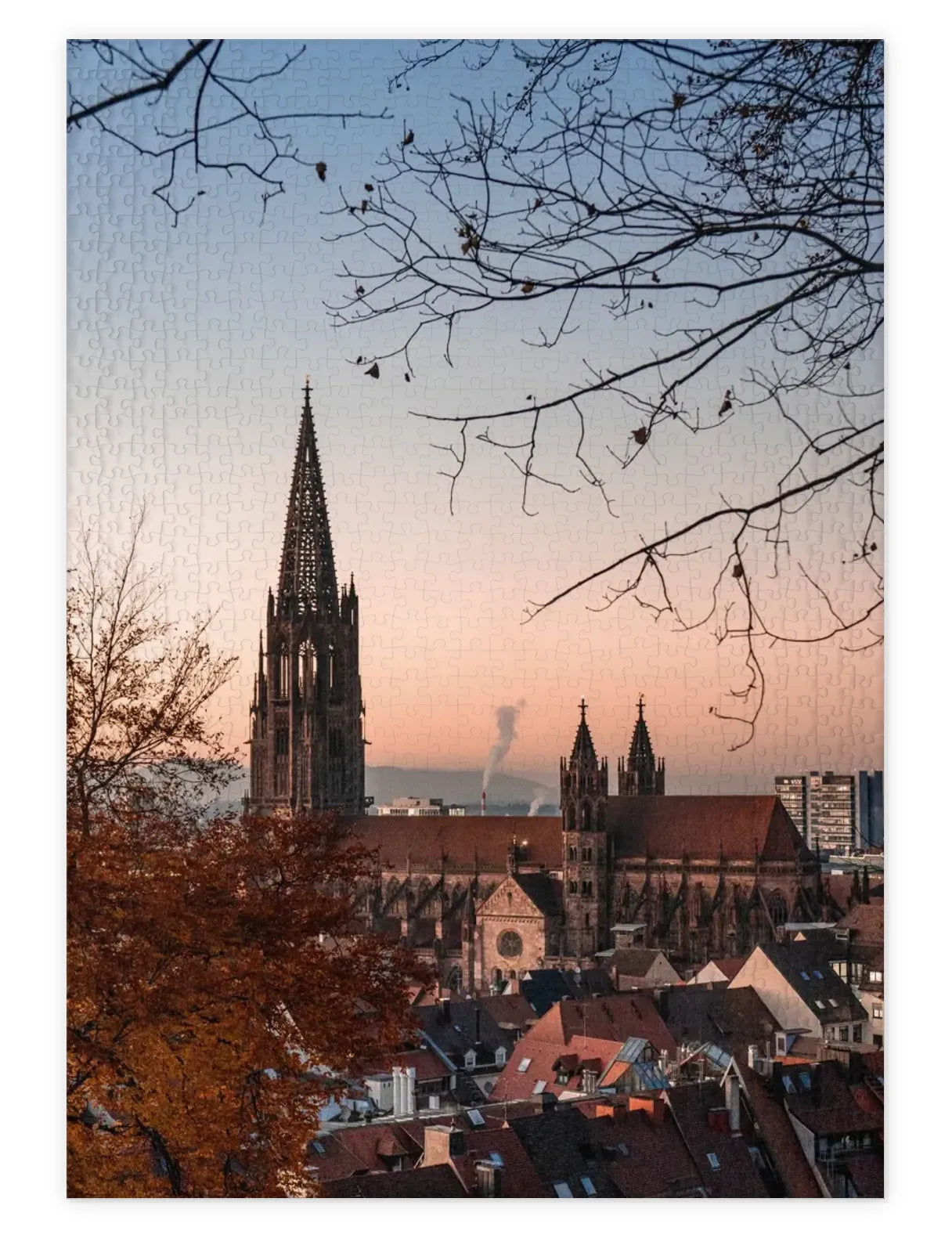 Mockup eines Puzzle der Altstadt von Freiburg im Abendlicht